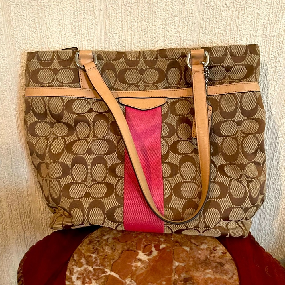 Coach purse with pink accent